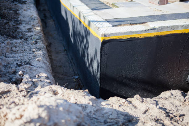 Professional Waterproofing technician working in Demotte, IN